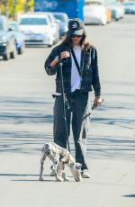 SASHA CALLE Out with Her Dog in Los Angeles 02/27/2021