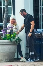 SHARNA BURGESS and Brian Austin Green at Car Wash in Malibu 01/31/2021