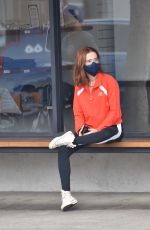ZOEY DEUTCH Leaves Alfred Coffee in Los Angeles 02/10/2021