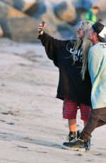 AVRIL LAVIGNE and Mod Sun Out at a Beach in Santa Monica 03/11/2021