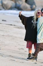 AVRIL LAVIGNE and Mod Sun Out at a Beach in Santa Monica 03/11/2021
