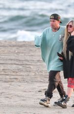 AVRIL LAVIGNE and Mod Sun Out at a Beach in Santa Monica 03/11/2021