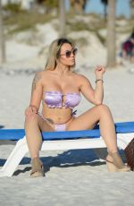 BELLA BUNNIE AMOR in Bikini at a Beach in Fort Lauderdale 03/11/2021
