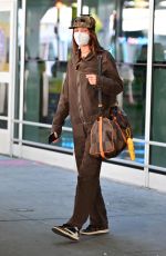 BELLA HADID at JFK Airport in New York 03/06/2021