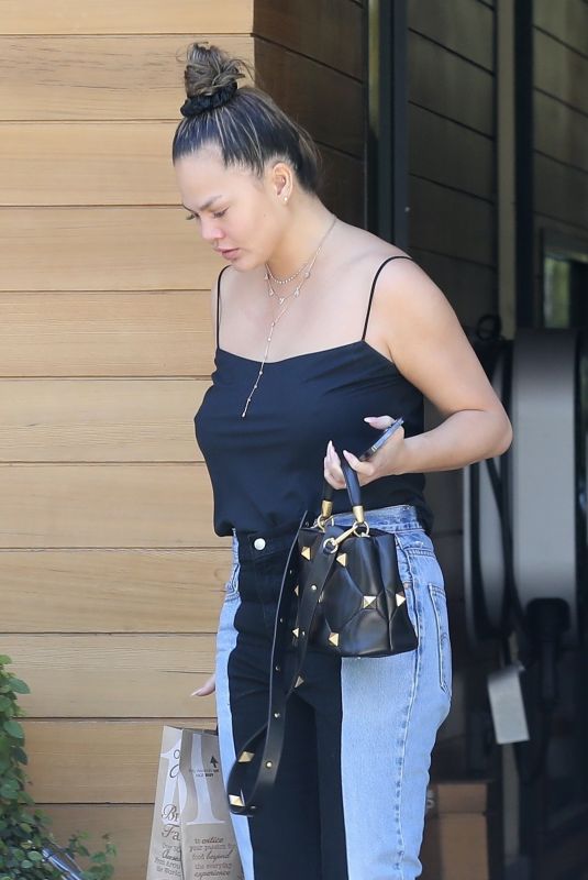 CHRISSY TEIGEN Out in Los Angeles 03/16/2021