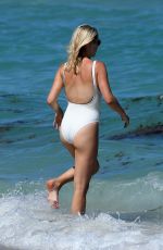 CLAIRE HOLT in Swimsuit at a Beach in Miami 03/27/2021