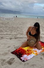 CLAUDIA ROMANI in Bikini at Miami Beach 02/28/2021