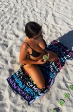 CLAUDIA ROMANI in Bikini Celebrates St Patrick