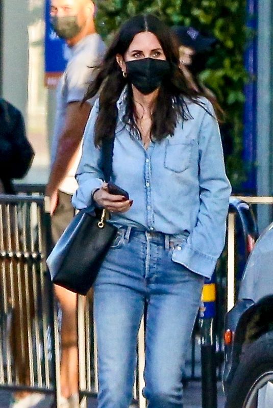 COURTENEY COX in Double Denim Out Shopping on Melrose Place in West Hollywood 03/18/2021