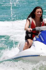 DEMI LOVATO in Bikini on the Beach in Cabo San Lucas 06/16/2010