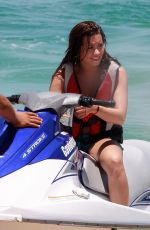 DEMI LOVATO in Bikini on the Beach in Cabo San Lucas 06/16/2010