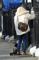 EMILIA CLARKE Out with her Dog in London 03/07/2021