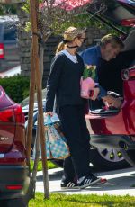 FELICITY HUFFMAN Arrives at a Friend