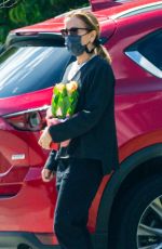 FELICITY HUFFMAN Arrives at a Friend