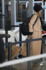 FELICITY HUFFMAN at LAX Airport in Los Angeles 03/09/2021