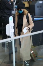 FELICITY HUFFMAN at LAX Airport in Los Angeles 03/09/2021
