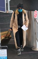 FELICITY HUFFMAN at LAX Airport in Los Angeles 03/09/2021