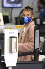 FLORENCE PUGH at LAX Airport in Los Angeles 03/03/2021