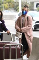 FLORENCE PUGH at LAX Airport in Los Angeles 03/03/2021