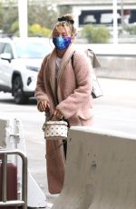 FLORENCE PUGH at LAX Airport in Los Angeles 03/03/2021