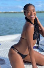 GABRIELLE UNION in Bikinis at a Boat 03/12/2021
