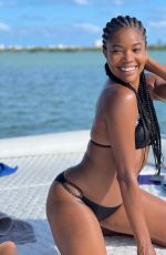 GABRIELLE UNION in Bikinis at a Boat 03/12/2021