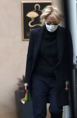 GILLIAN ANDERSON Out in Prague 03/05/2021