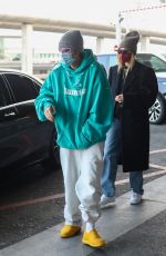 HAILEY and Justin BIEBER at Roissy CDG Airport in Paris 03/03/2021