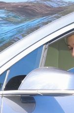 HAILEY BIEBER Out Driving in Los Angeles 03/08/2021