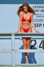 HALEY KALIL in a Red Bikini at a Photoshoot in Malibu 03/16/2021