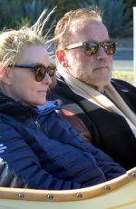 HEATHER MILLIGAN and Arnold Schwarzenegger Out Driving in Los Angeles 03/13/2021