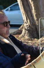 HEATHER MILLIGAN and Arnold Schwarzenegger Out Driving in Los Angeles 03/13/2021