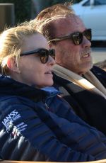 HEATHER MILLIGAN and Arnold Schwarzenegger Out Driving in Los Angeles 03/13/2021
