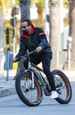 HEATHER MILLIGAN and Arnold Schwarzenegger Out Riding Bikes in Santa Monica 03/13/2021