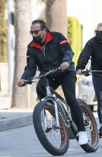 HEATHER MILLIGAN and Arnold Schwarzenegger Out Riding Bikes in Santa Monica 03/13/2021
