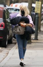 HOLLY WILLOGHBY Leaves Her Home in London 02/28/2021