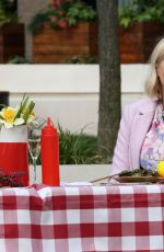 HOLLY WILLOGHBY on the Set of This Morning 03/29/2021 