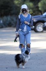 HOLY MADISON in Ripped Denim Out with Her Dog in Los Angeles 03/02/2021