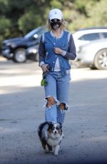 HOLY MADISON in Ripped Denim Out with Her Dog in Los Angeles 03/02/2021