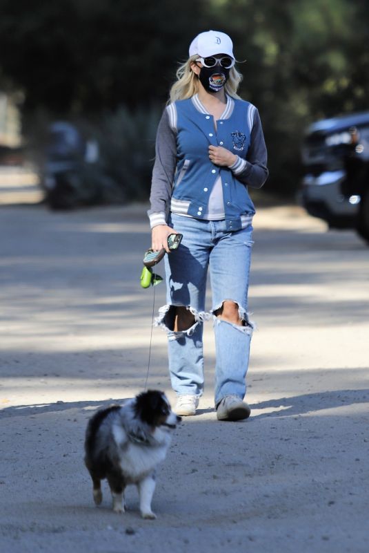 HOLY MADISON in Ripped Denim Out with Her Dog in Los Angeles 03/02/2021