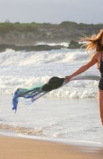 JANE SEYMOUR in a Blac Swimsuit at a Beach in Hawaii 03/11/2021
