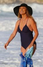 JANE SEYMOUR in a Blac Swimsuit at a Beach in Hawaii 03/11/2021