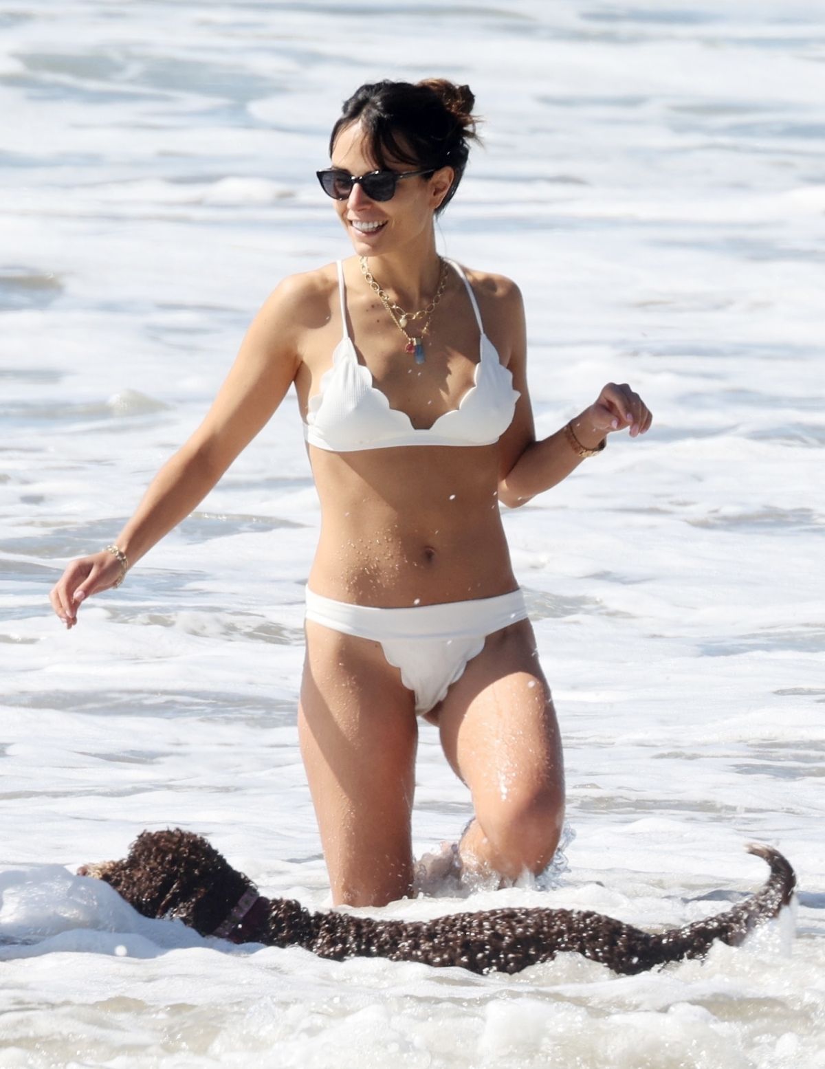 JORDANA BREWSTER in a White Bikini at a Beach in Santa Monica 03/06/2021. 