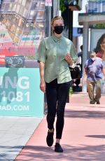 KARLIE KLOSS Out and About in Miami 03/24/2021