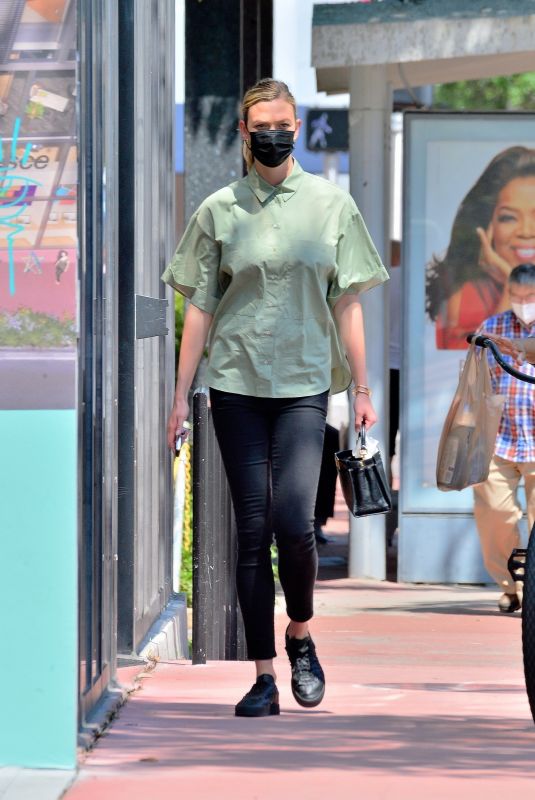 KARLIE KLOSS Out and About in Miami 03/24/2021