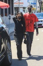 KORTNEY KARDASHIAN and Travis Barker Out in West Hollywood 03/26/2021