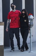 KORTNEY KARDASHIAN and Travis Barker Out in West Hollywood 03/26/2021