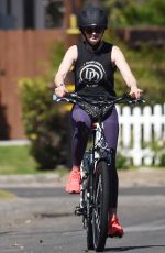 KRYSTEN RITTER Out Riding Electric Bicycle in Los Angeles 03/05/2021