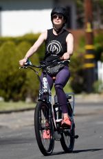 KRYSTEN RITTER Out Riding Electric Bicycle in Los Angeles 03/05/2021