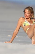 LARA BINGLE in Bikinis at a Photoshoot on the Beach in Sydney 03/04/2021